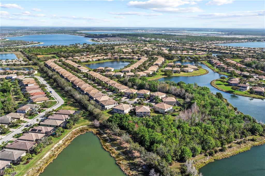 20674 Larino Loop Estero, FL 33928 - Photo 36 of 50 an aerial view of city and lake