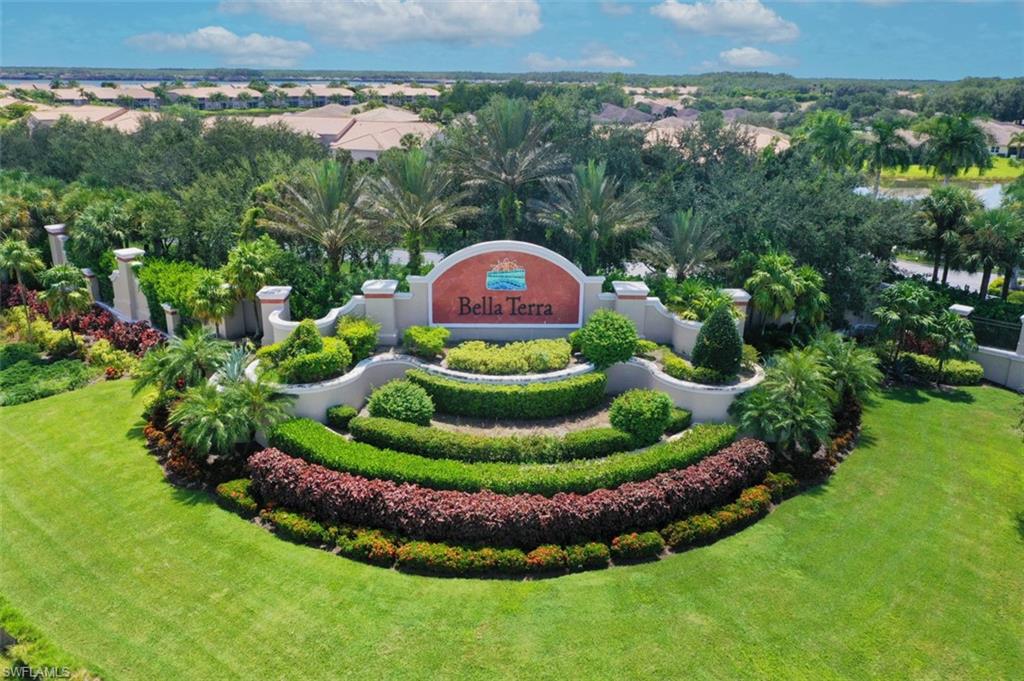 20674 Larino Loop Estero, FL 33928 - Photo 38 of 50 a view of a garden with a swimming pool