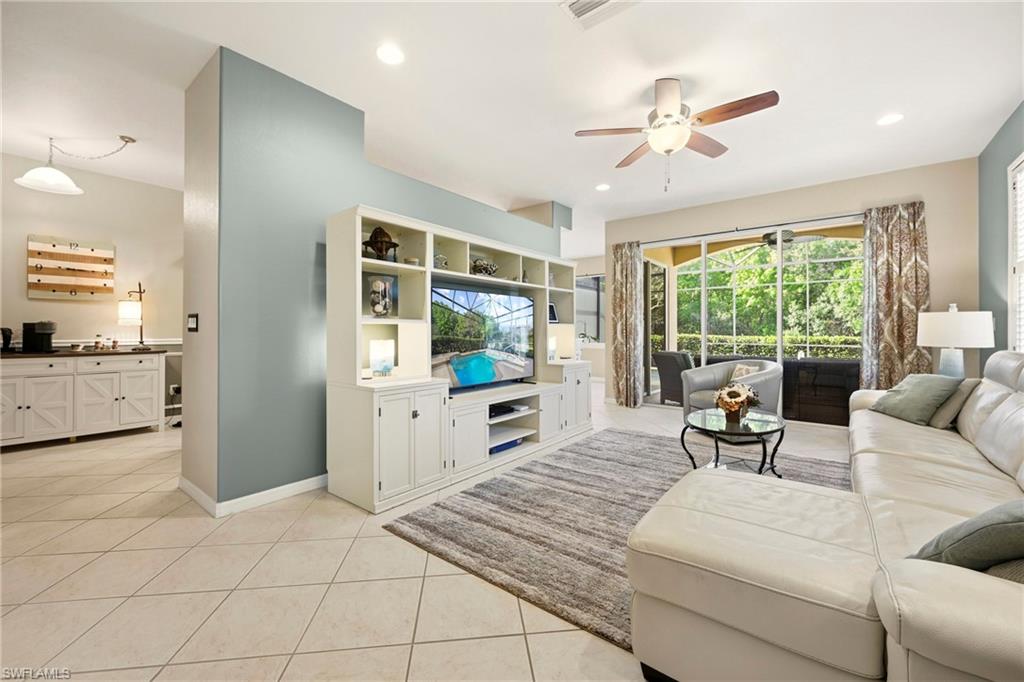 20674 Larino Loop Estero, FL 33928 - Photo 5 of 50 a living room with furniture and a large window