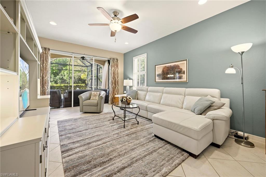 20674 Larino Loop Estero, FL 33928 - Photo 6 of 50 a living room with furniture and a large window