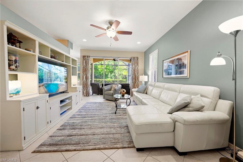 20674 Larino Loop Estero, FL 33928 - Photo 7 of 50 a living room with furniture and a flat screen tv