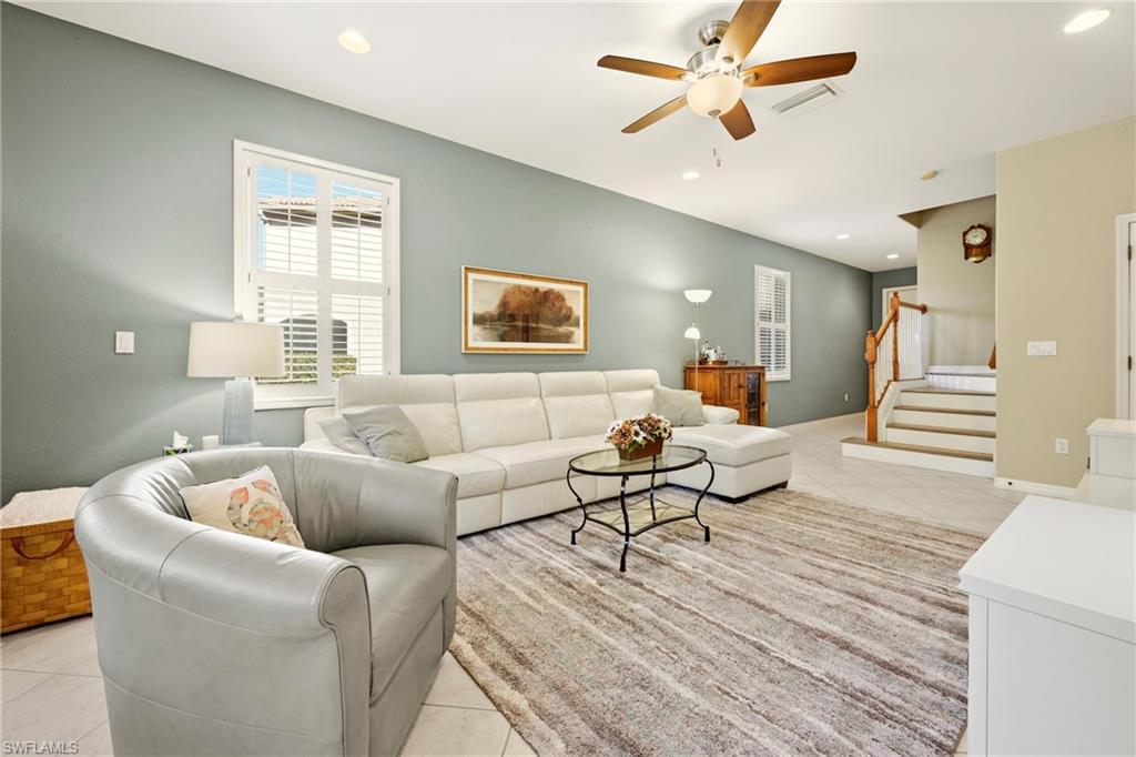 20674 Larino Loop Estero, FL 33928 - Photo 8 of 50 a living room with furniture and a large window