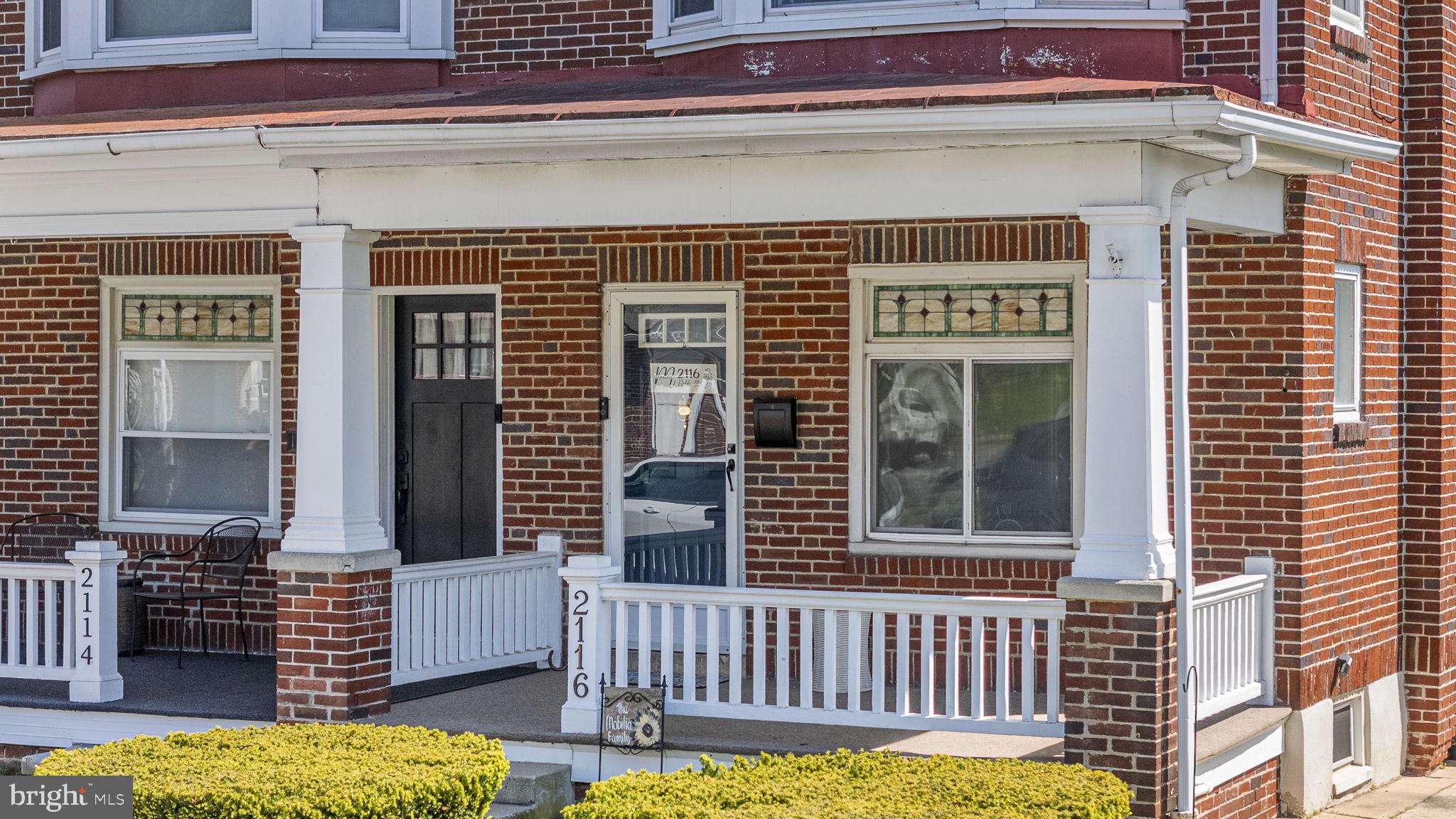 2116 Noble Street Reading, PA 19609 - Photo 3 of 35 Charming brick facade with inviting porch.