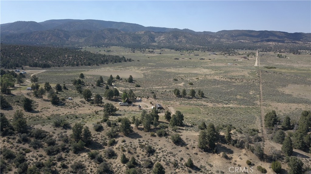 0 Lockwood Valley Road Frazier Park, CA 93225 - Photo 5 of 17 a view of a dry field with trees in the background