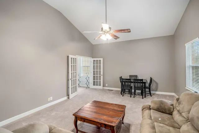 a view of a patio in a backyard