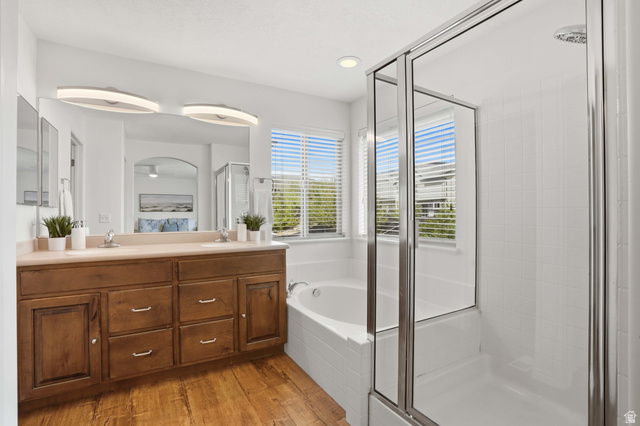 2007 Fielding Hill Lane Draper, UT 84020 - Photo 24 of 83 Bathroom featuring a double vanity with wood-finish cabinetry and a light-toned countertop