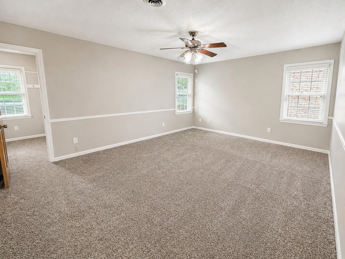 2148 Riverdale Road Germantown, TN 38138 - Photo 17 of 22 a view of an empty room with a window