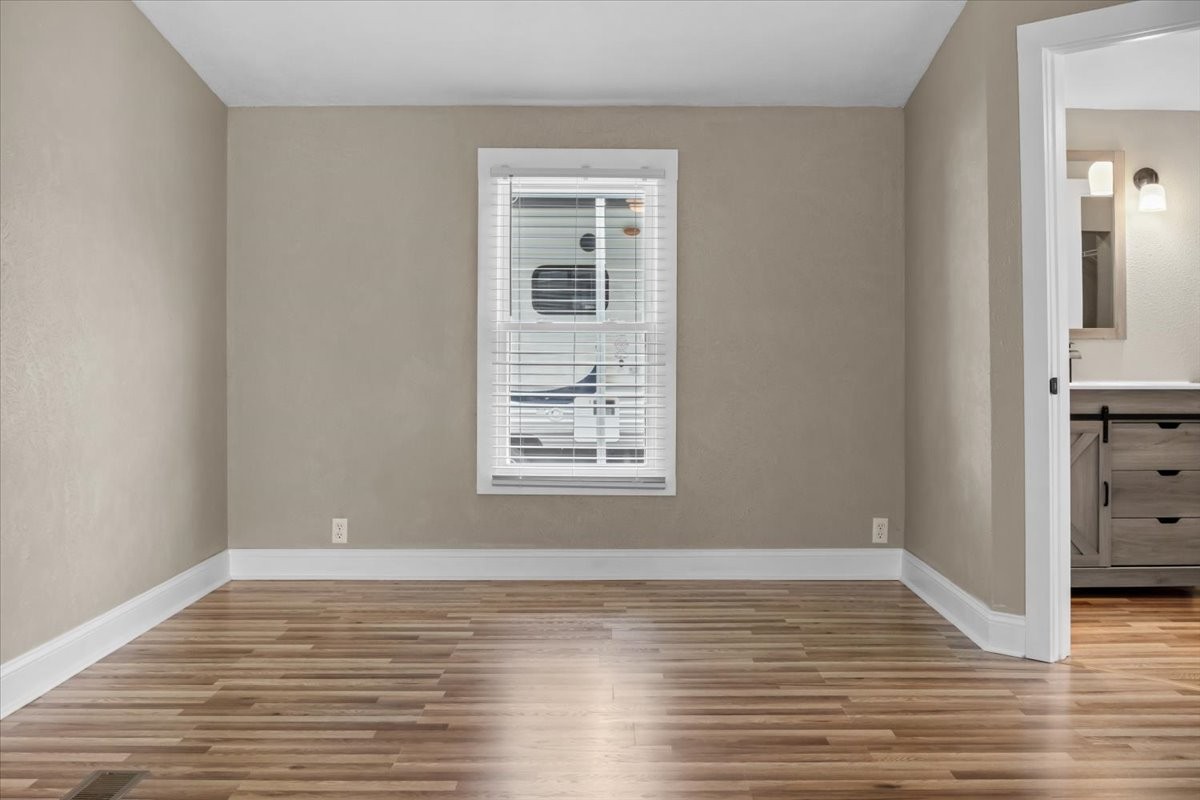 1112 Garners Creek Road Dickson, TN 37055 - Photo 26 of 57 a view of a room with wooden floor and cabinet