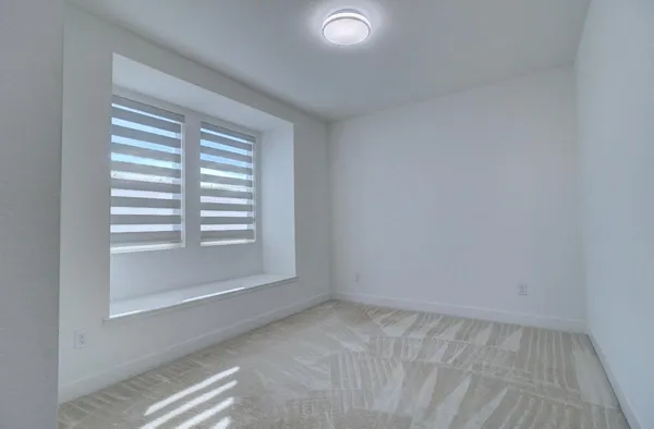 an empty room with a window