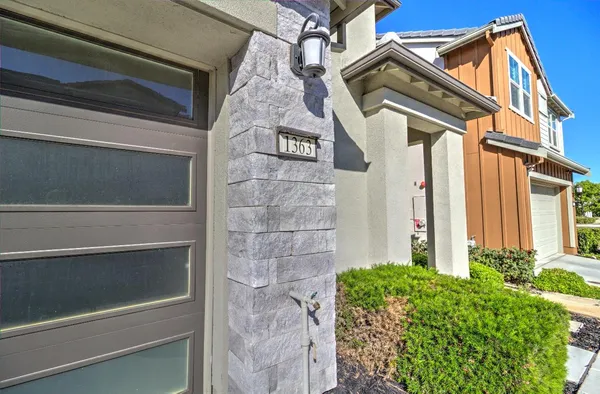 a view of a house with a door and a window