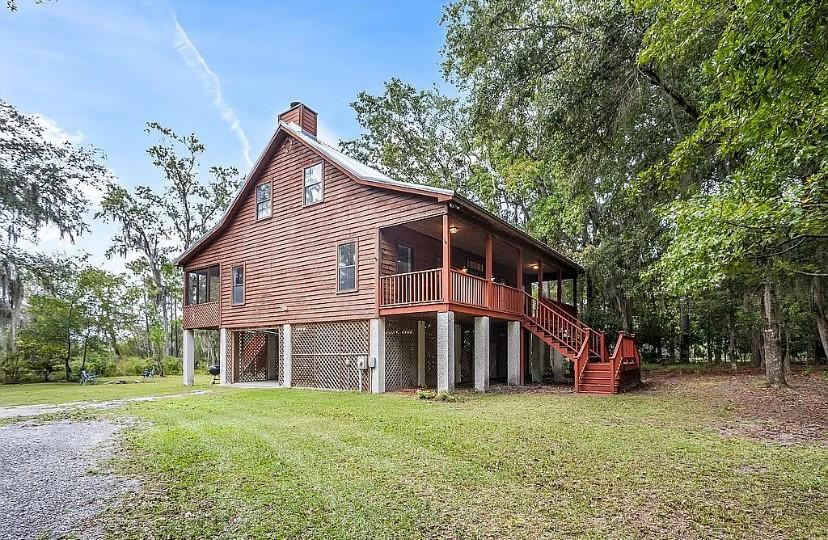 1525 Black Island Road Darien, GA 31305 - Photo 2 of 41 a view of a house with a yard