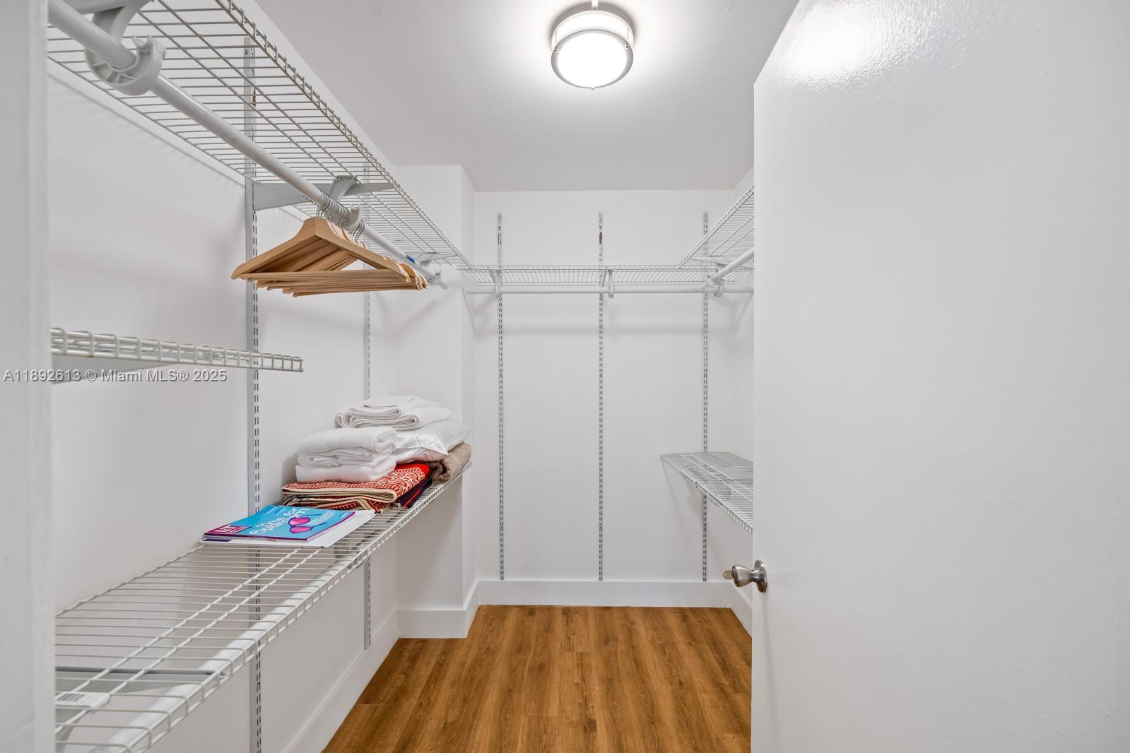 1440 Brickell Bay Drive, Unit 307 Miami, FL 33131 - Photo 17 of 28 a room with storage and utility