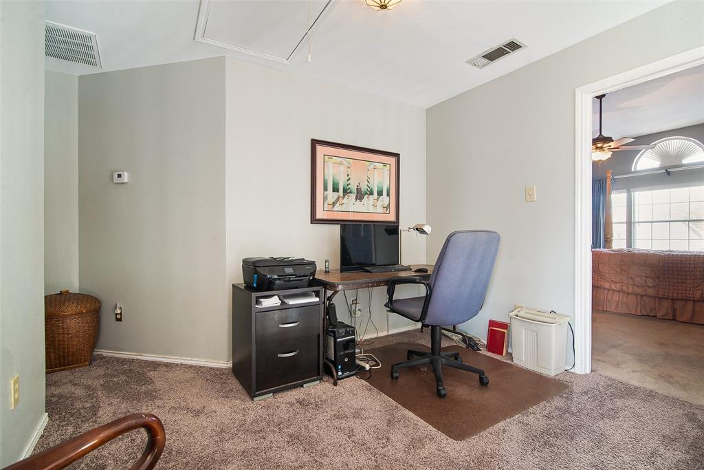 409 Red River Trail Irving, TX 75063 - Photo 20 of 31 a view of a workspace with furniture and a window