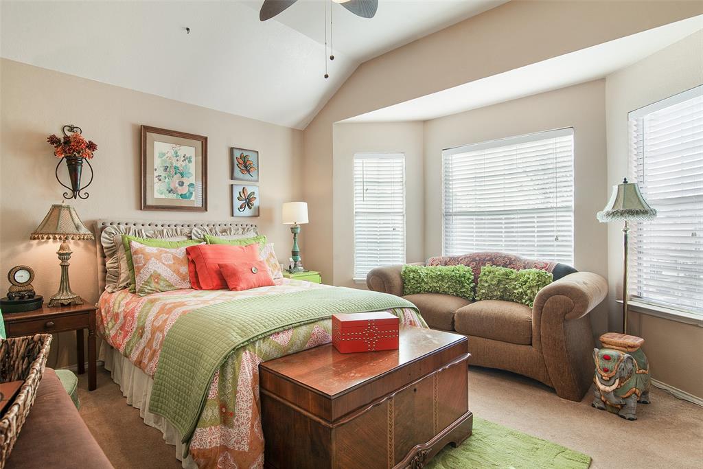 409 Red River Trail Irving, TX 75063 - Photo 24 of 31 a bedroom with a bed and a couch