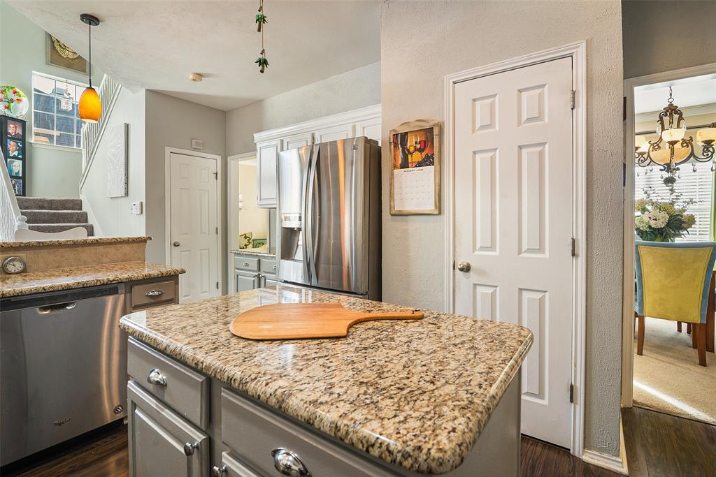 409 Red River Trail Irving, TX 75063 - Photo 7 of 31 a bathroom with a granite countertop sink and a mirror