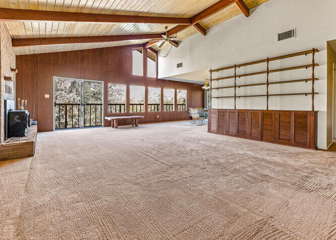 41000 Oak Ridge Drive Three Rivers, CA 93271 - Photo 3 of 39 a big room with a bed and a large window