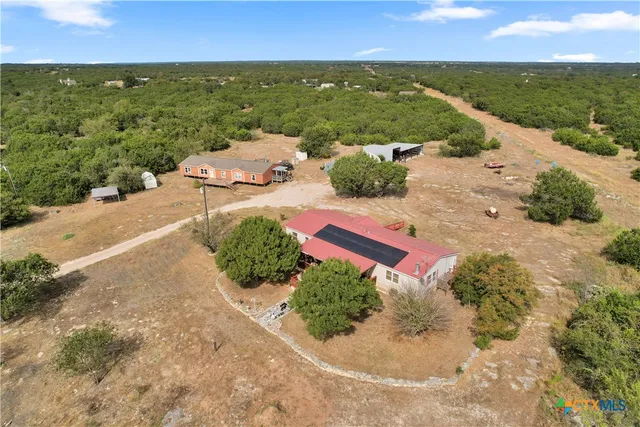 a view of a street with an ocean