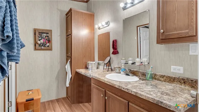 a view of swimming pool with patio