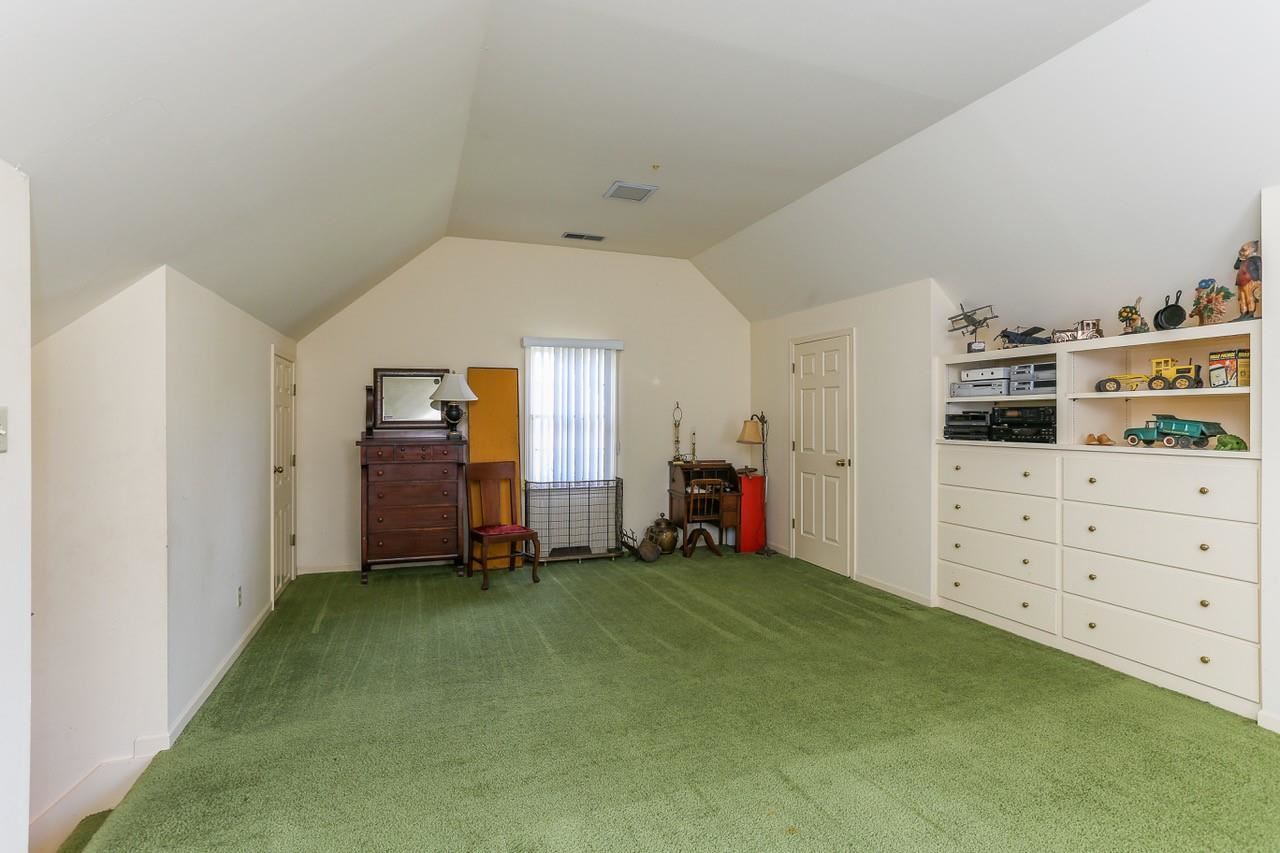 319 Inkberry Lane Memphis, TN 38117 - Photo 21 of 24 Large bonus room located above laundry/kitchen & garage