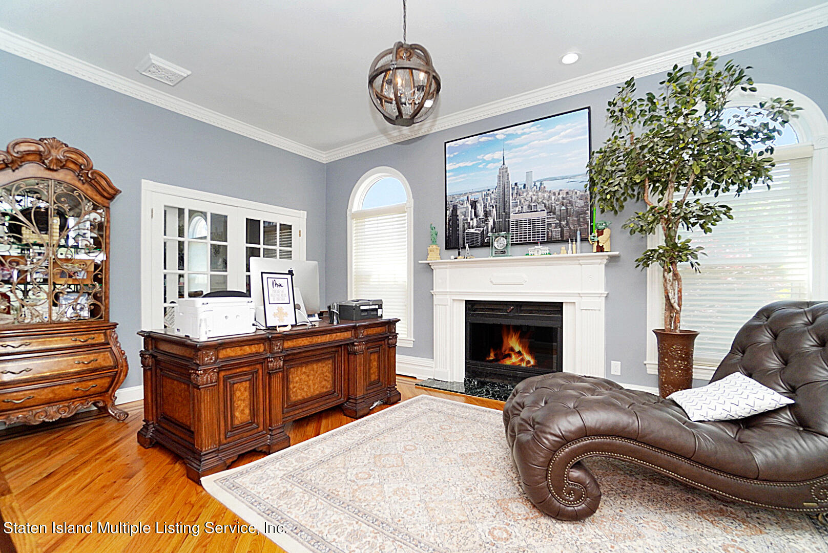 312 Shore Road Staten Island, NY 10307 - Photo 15 of 73 a living room with furniture and a fireplace