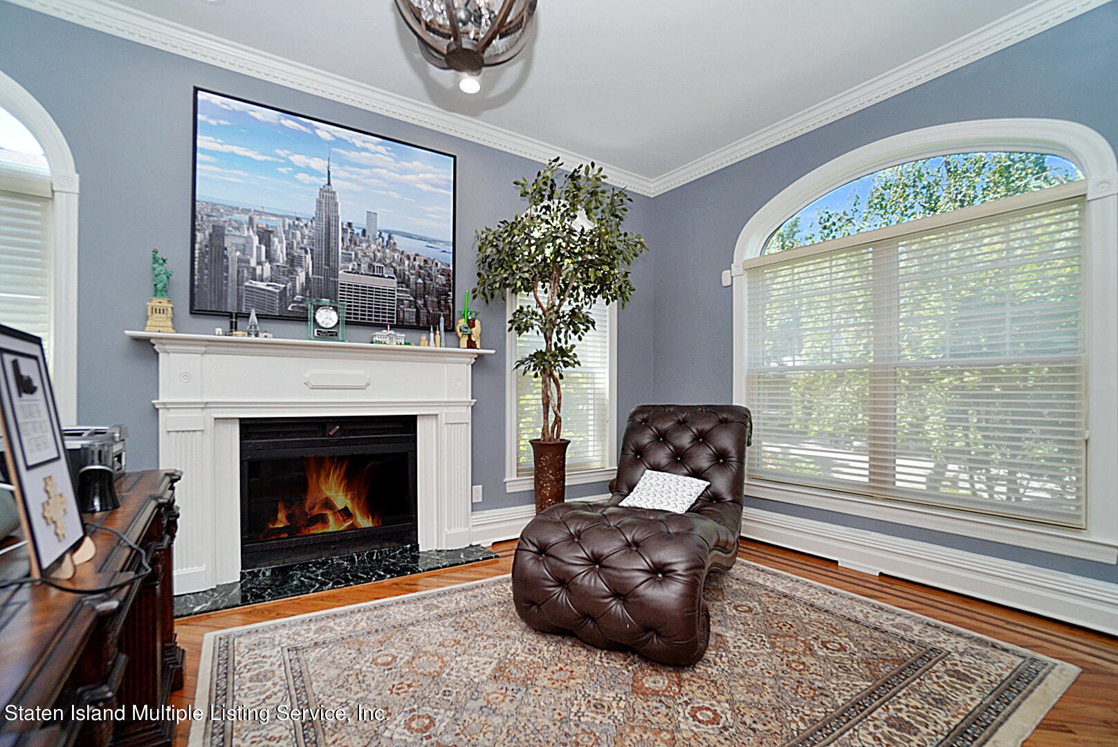 312 Shore Road Staten Island, NY 10307 - Photo 16 of 73 a living room with furniture and a fireplace