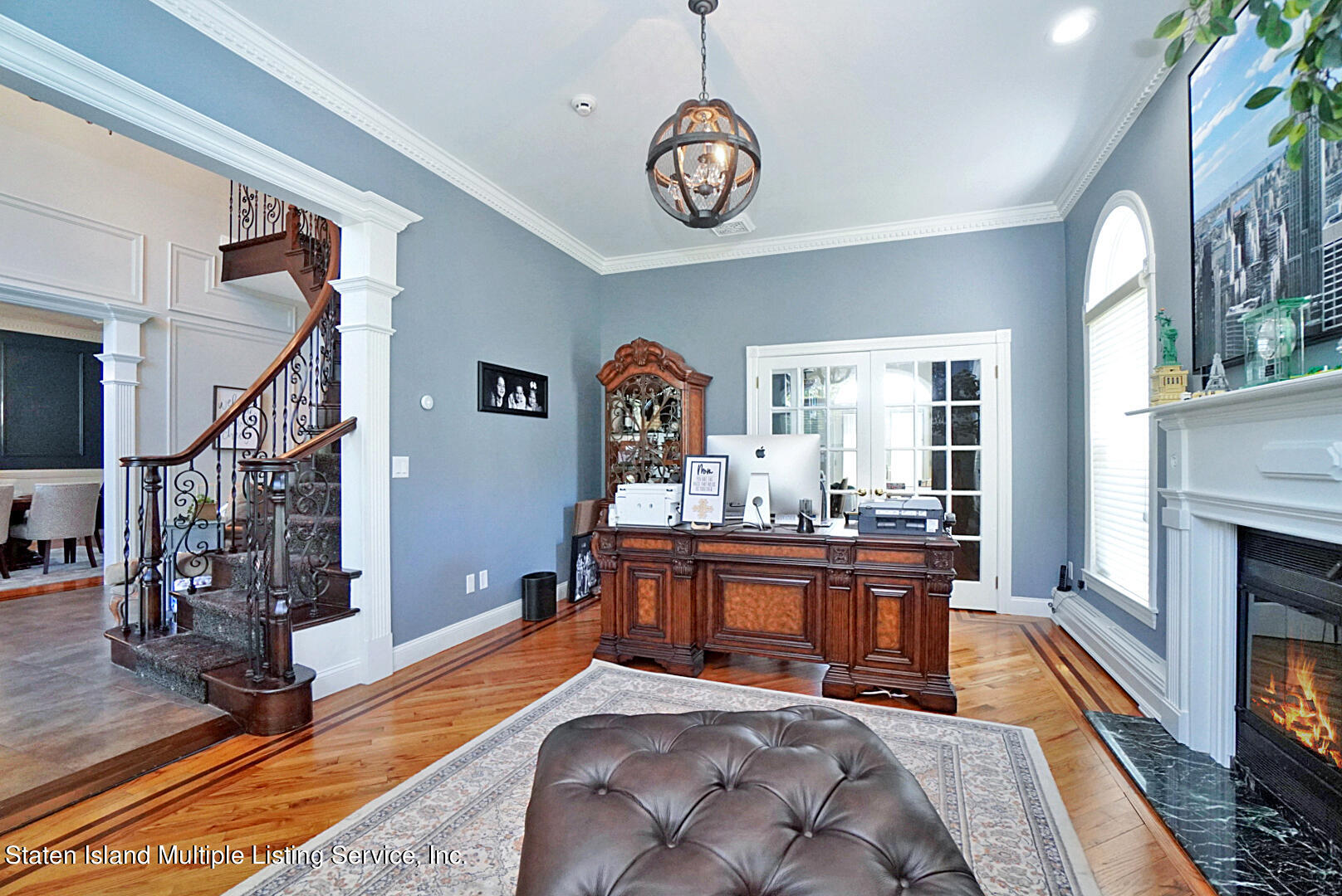 312 Shore Road Staten Island, NY 10307 - Photo 17 of 73 a bedroom with furniture and a fireplace