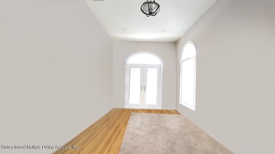312 Shore Road Staten Island, NY 10307 - Photo 18 of 73 an empty room with a window