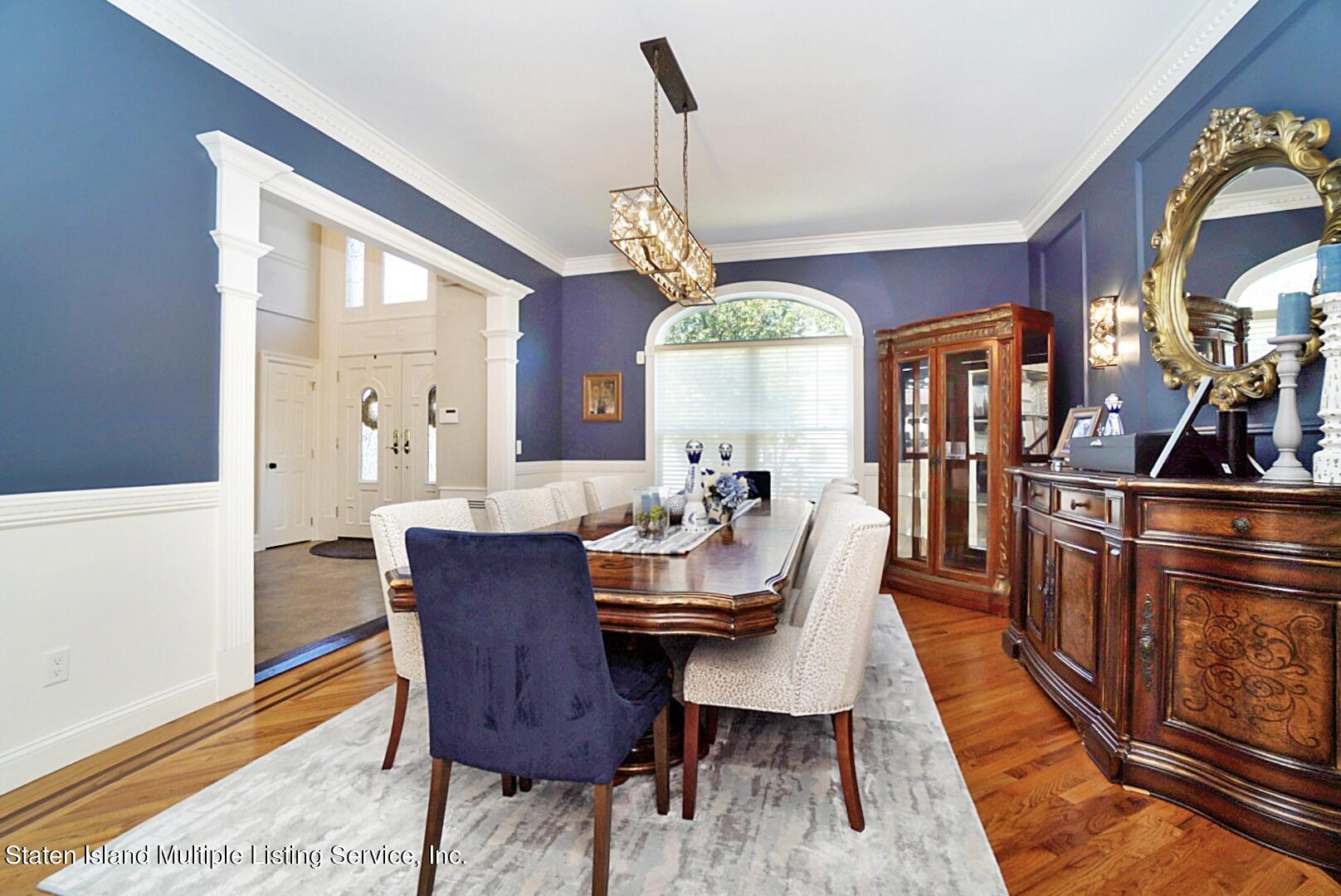 312 Shore Road Staten Island, NY 10307 - Photo 20 of 73 a view of a dining room with furniture window and wooden floor