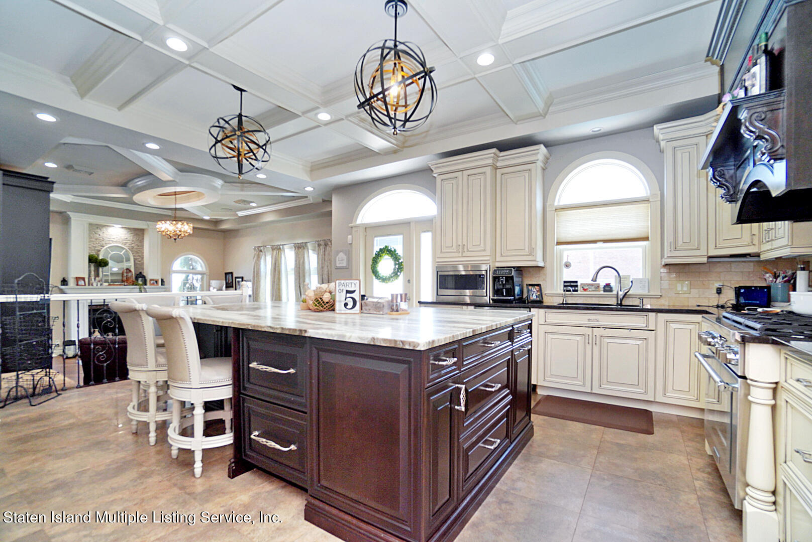 312 Shore Road Staten Island, NY 10307 - Photo 23 of 73 a kitchen with a sink a counter space appliances and cabinets