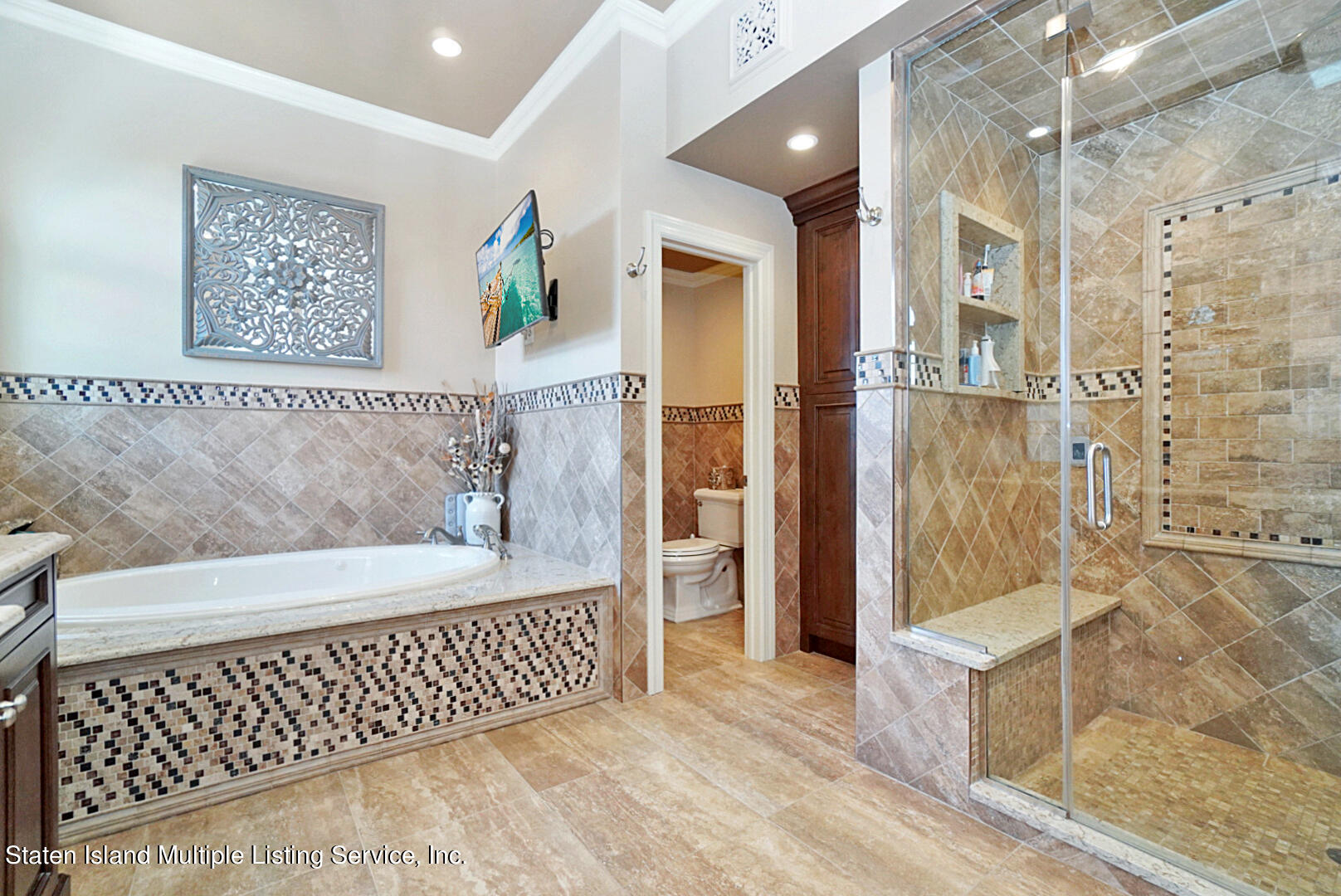 312 Shore Road Staten Island, NY 10307 - Photo 44 of 73 a bathroom with a bathtub and a shower