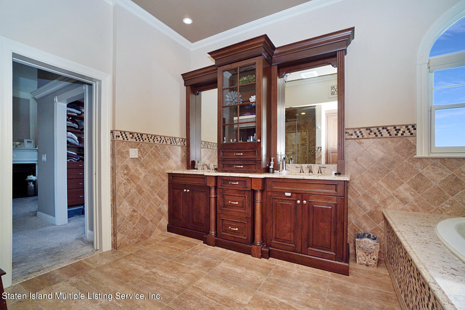 312 Shore Road Staten Island, NY 10307 - Photo 45 of 73 a bathroom with a sink and a mirror