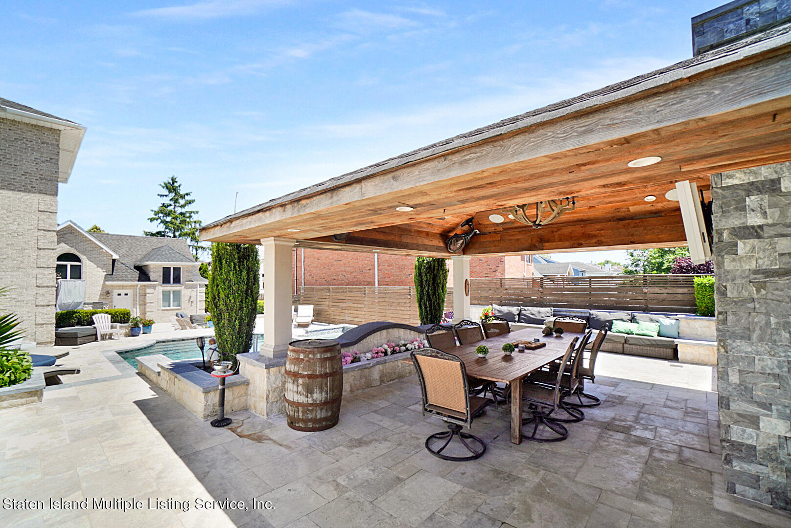 312 Shore Road Staten Island, NY 10307 - Photo 65 of 73 a view of a tables and chairs in patio