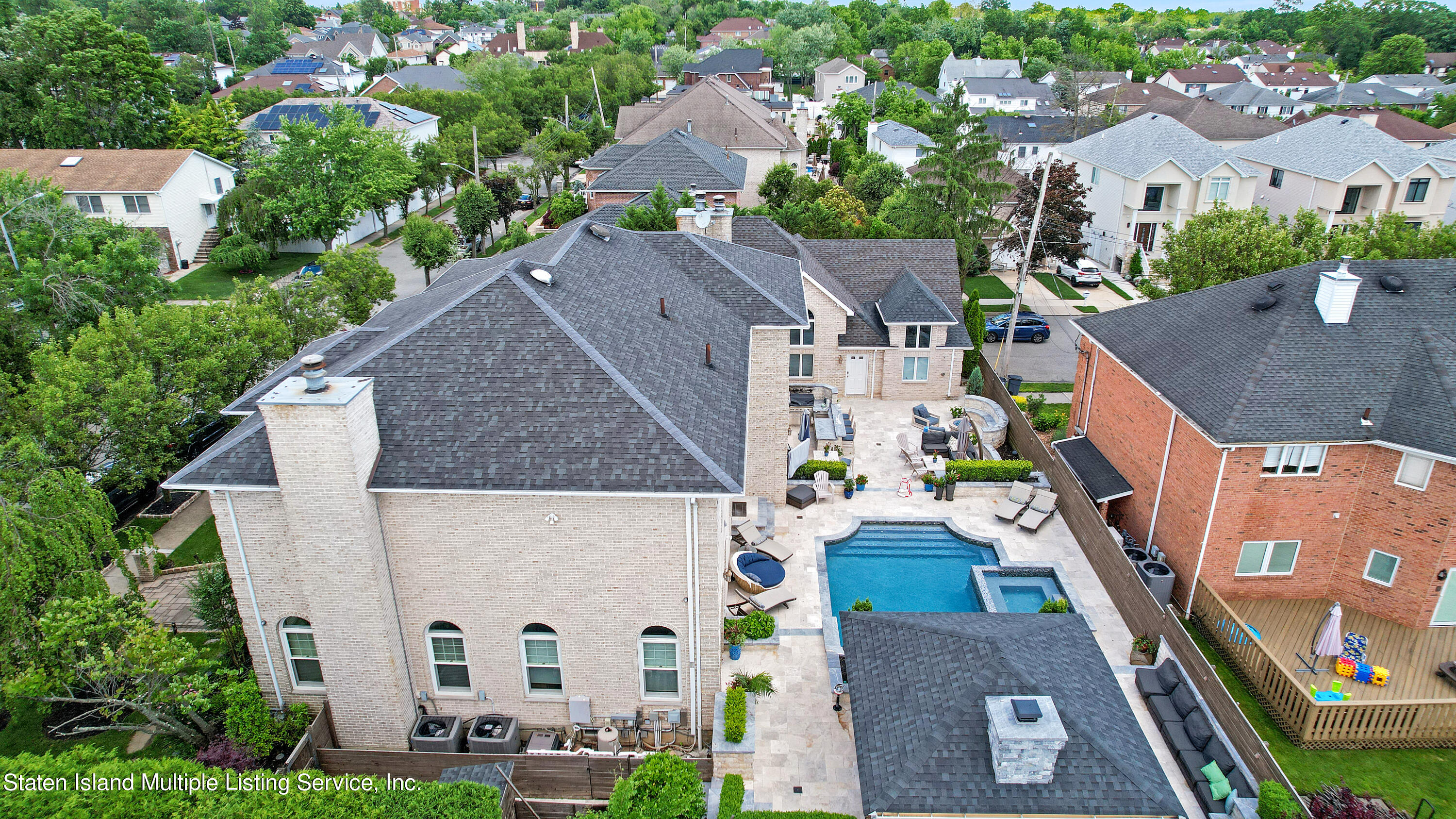 312 Shore Road Staten Island, NY 10307 - Photo 9 of 73 an aerial view of multiple houses with a yard
