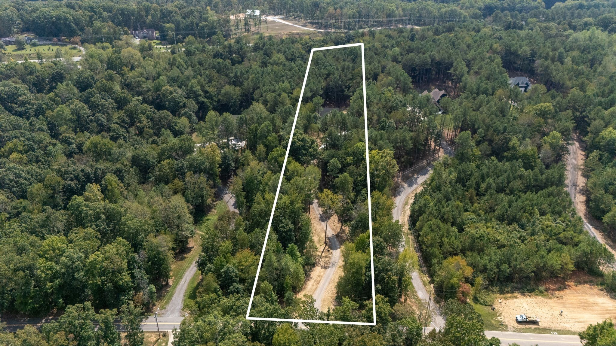 1064 Garton Road Burns, TN 37029 - Photo 44 of 53 an aerial view of a house with a yard