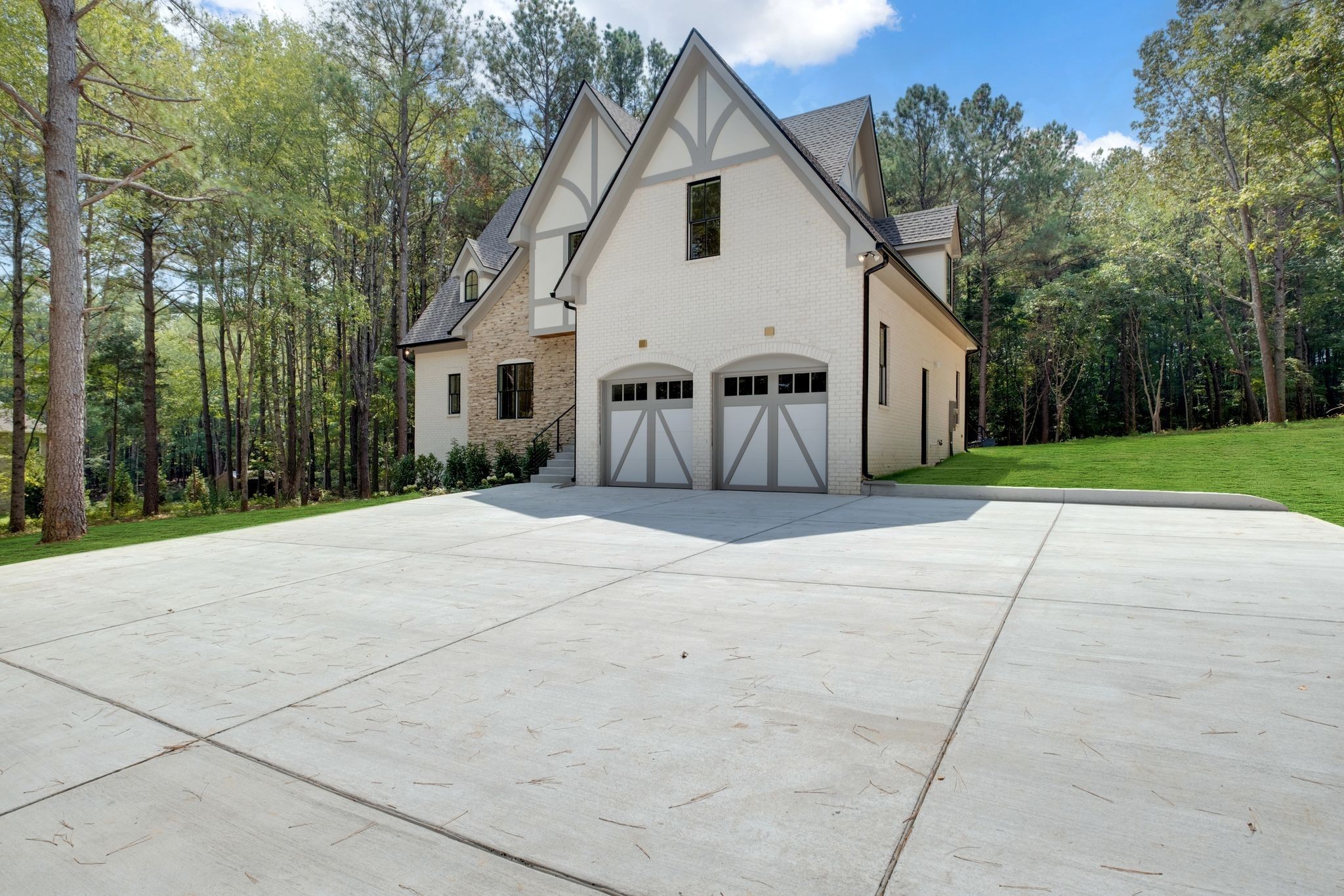 1064 Garton Road Burns, TN 37029 - Photo 49 of 53 a view of a house with backyard and trees