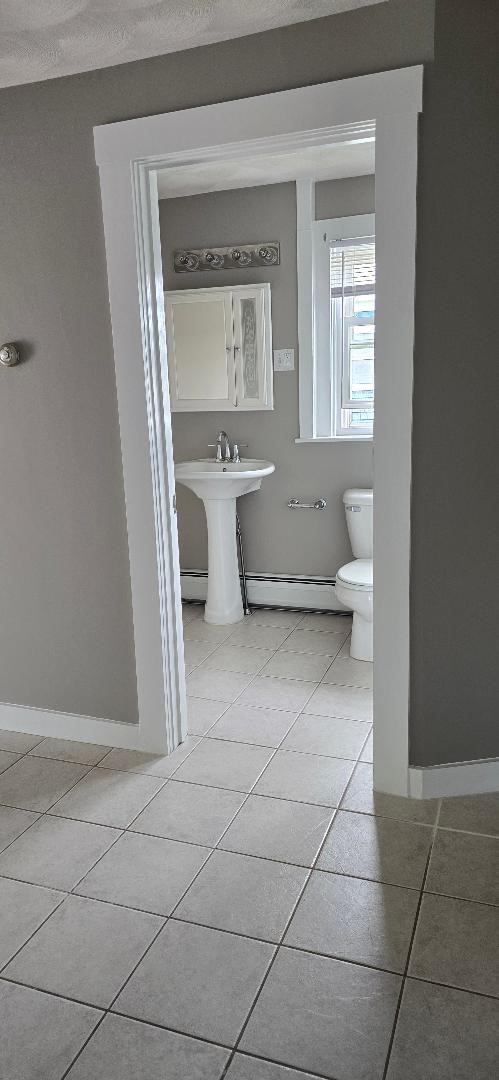 31 First School Street, Unit 2 Bristol, RI 02809 - Photo 14 of 20 kitchen looking into bathroom