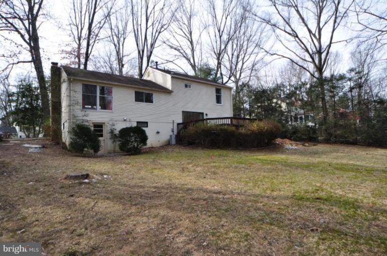 2509 Foxcroft Way Reston, VA 20191 - Photo 12 of 22 a view of a house with a back yard