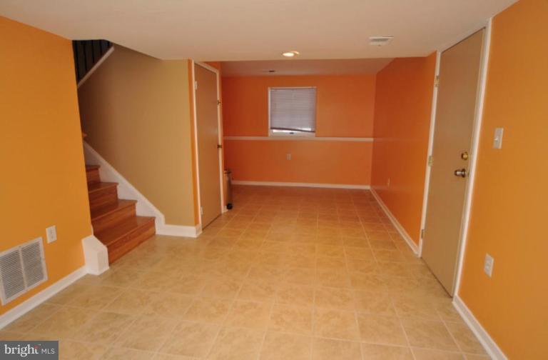 2509 Foxcroft Way Reston, VA 20191 - Photo 21 of 22 a view of an empty room with stairs