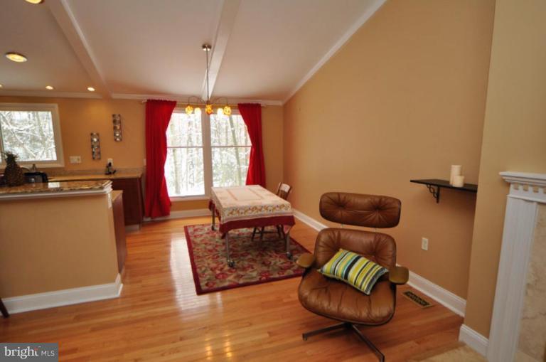 2509 Foxcroft Way Reston, VA 20191 - Photo 5 of 22 a living room with furniture and a large window