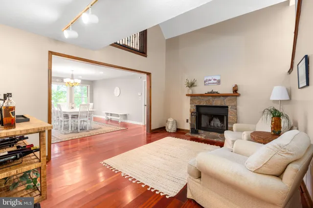 a spacious bedroom with a large bed and a large window