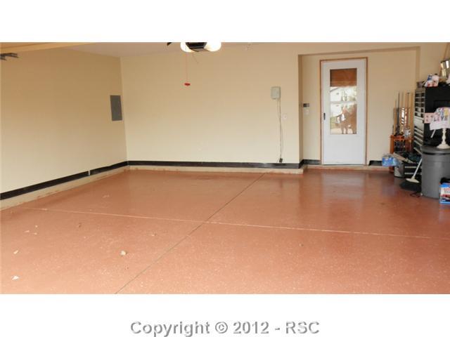 7804 French Road Colorado Springs, CO 80920 - Photo 14 of 14 Finished garage with epoxy floors