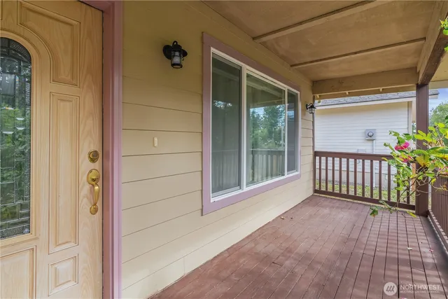 a view of a porch with a door