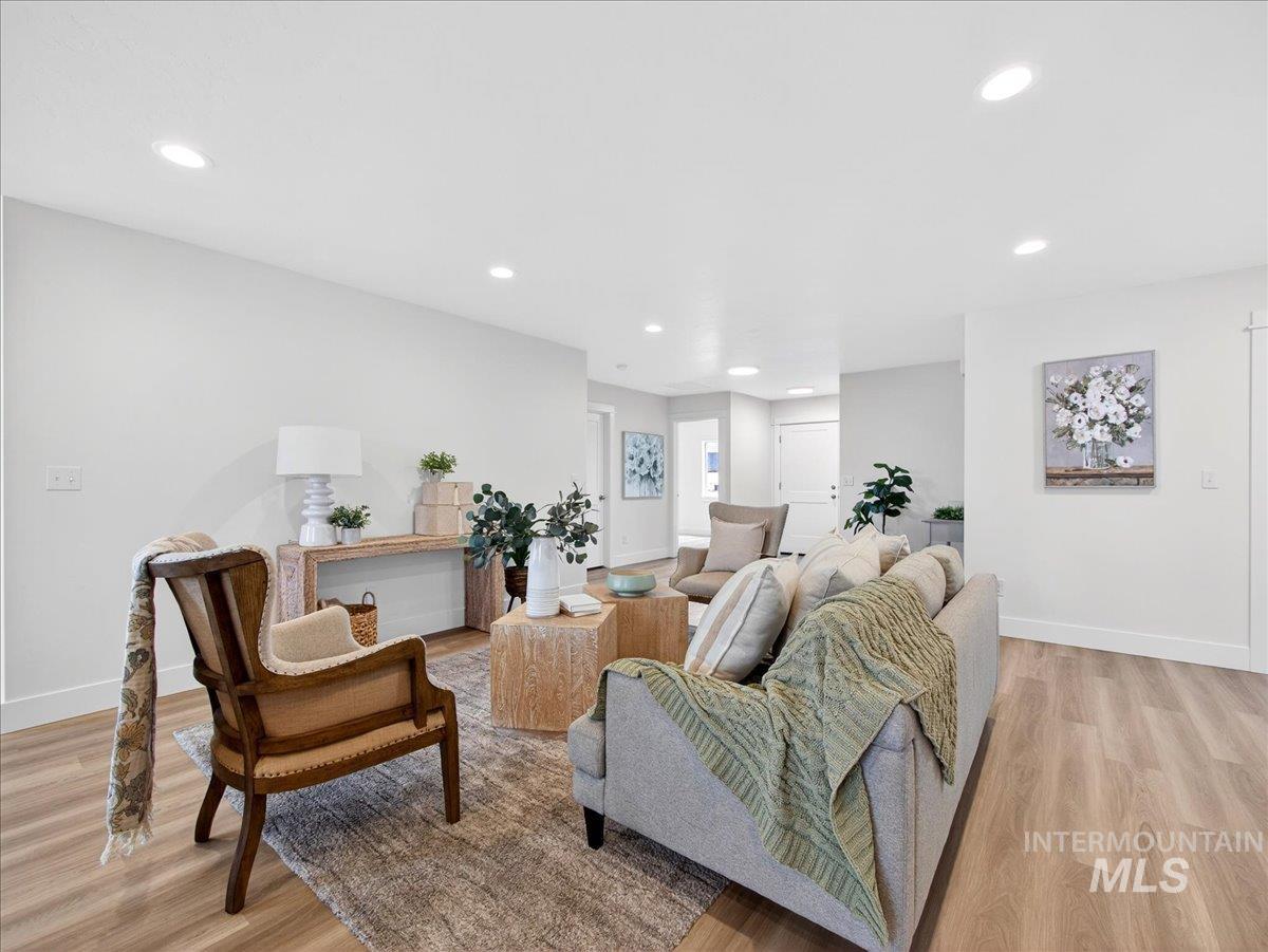 1611 Regency Way Emmett, ID 83617 - Photo 12 of 47 Living area featuring light wood-style floors and recessed lighting