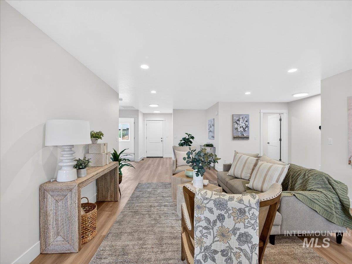 1611 Regency Way Emmett, ID 83617 - Photo 14 of 47 Living room with light wood-type flooring and recessed lighting
