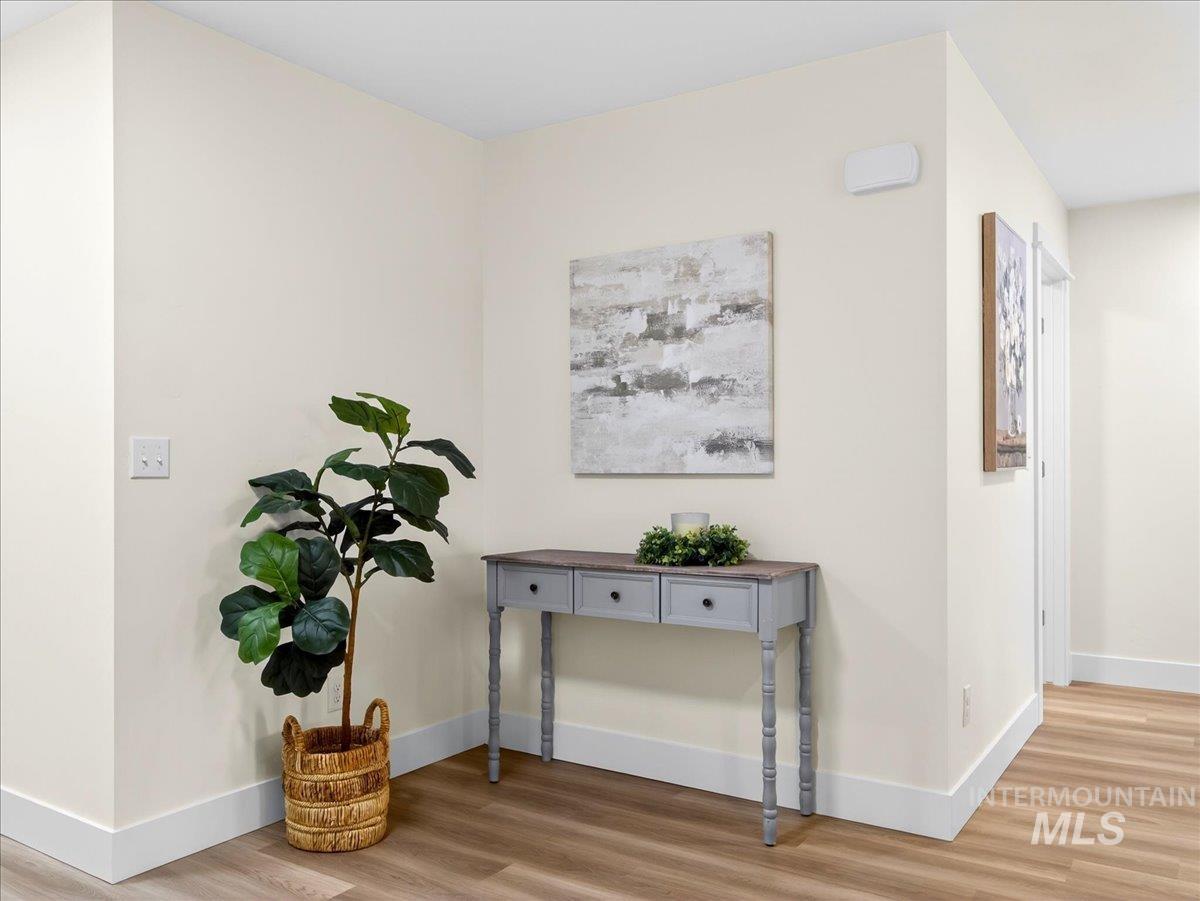 1611 Regency Way Emmett, ID 83617 - Photo 21 of 47 Hall featuring light wood finished floors and baseboards