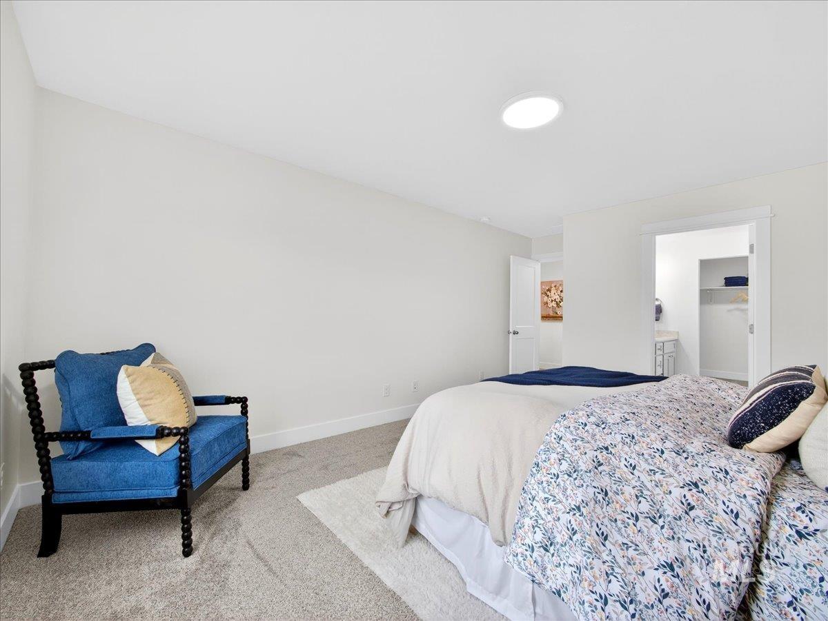 1611 Regency Way Emmett, ID 83617 - Photo 24 of 47 Carpeted bedroom with baseboards and ensuite bathroom