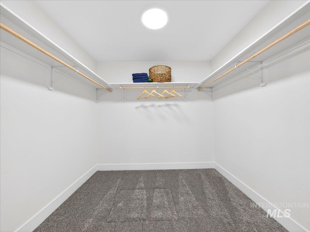 1611 Regency Way Emmett, ID 83617 - Photo 28 of 47 Walk in closet with dark colored carpet