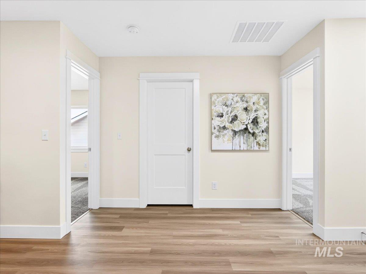 1611 Regency Way Emmett, ID 83617 - Photo 31 of 47 Hall featuring light wood-type flooring