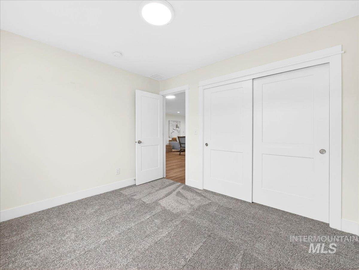 1611 Regency Way Emmett, ID 83617 - Photo 33 of 47 Unfurnished bedroom with carpet floors and a closet