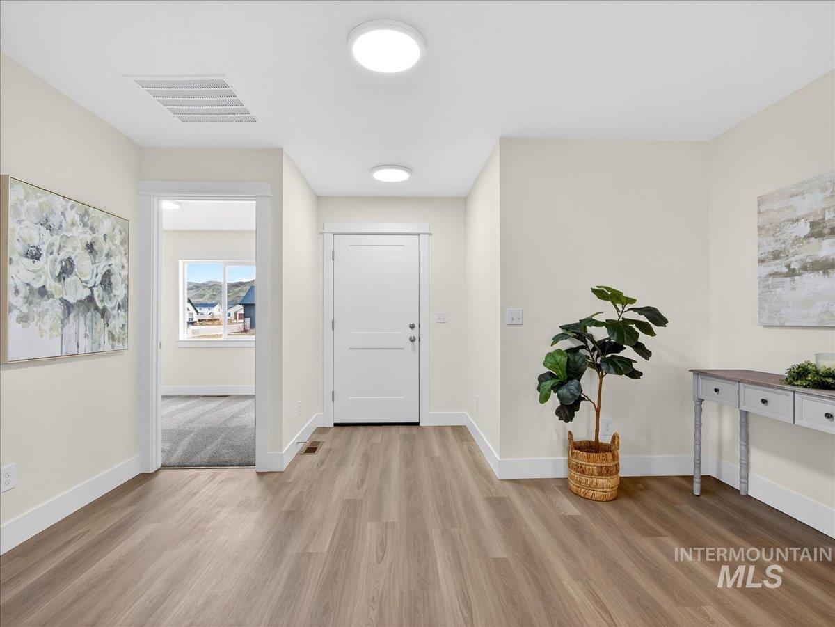 1611 Regency Way Emmett, ID 83617 - Photo 8 of 47 Foyer with baseboards and light wood finished floors